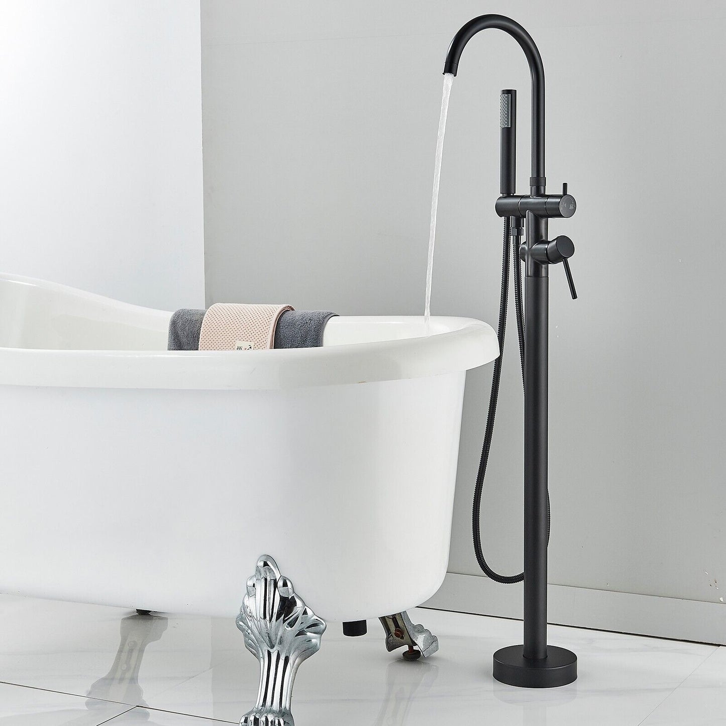 Freestanding Black Bathtub Faucet with Round Spout and Handheld Shower Head