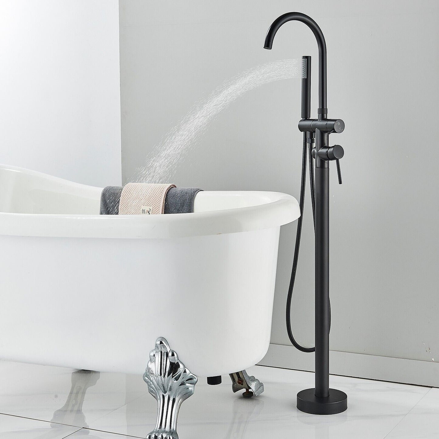 Freestanding Black Bathtub Faucet with Round Spout and Handheld Shower Head