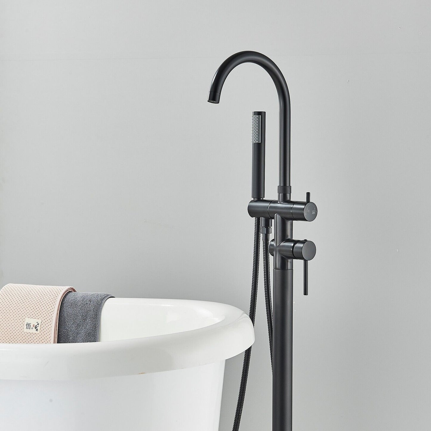 Freestanding Black Bathtub Faucet with Round Spout and Handheld Shower Head